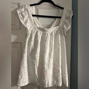 used but great condition. Beautiful white Lauren Conrad tank top.